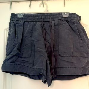 Medium LOFT shorts in charcoal gray. Pull-on with drawstring waist. 4” inseam.